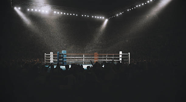 boxing-empty-professional-ring-with-crowd-picture-id618065428.jpg