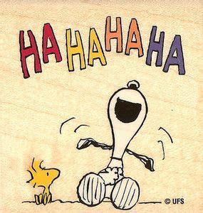 Snoopy holding belly laughing. Ha Ha Ha