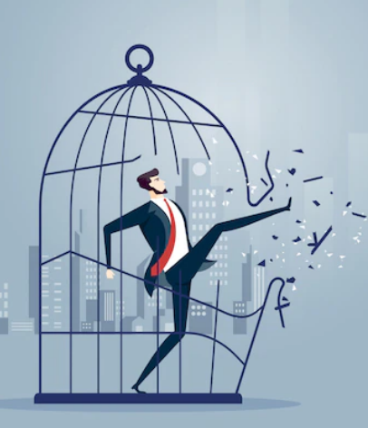 Businessman kicking cage and breaking free